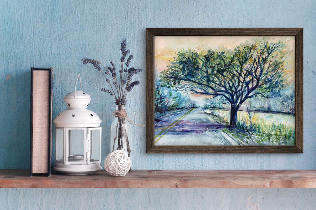Framed artwork of a tree on a wooden shelf with decorative items against a blue wall.